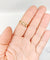 Bague 59 Bague jarretière en or rose 18k, perles et diamants taille rose, vers 1900 58 Facettes A07899