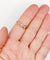 Bague 59 Bague jarretière en or rose 18k, perles et diamants taille rose, vers 1900 58 Facettes A07899