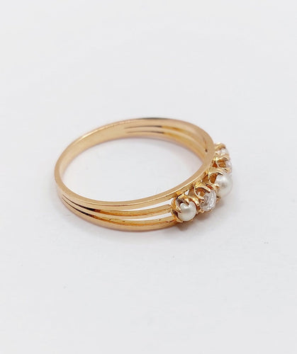 Bague 59 Bague jarretière en or rose 18k, perles et diamants taille rose, vers 1900 58 Facettes A07899