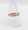 Bague 59 Bague jarretière en or rose 18k, perles et diamants taille rose, vers 1900 58 Facettes A07899