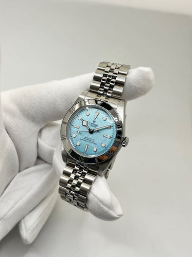 Montre Tudor Black Bay 54 - Montre automatique en acier, cadran bleu, 37 mm 58 Facettes 2330