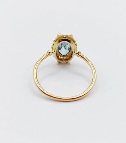 Bague 60 Art déco - Bague en or 18k, aigue-marine et couronne fleurie (vers 1920) 58 Facettes A07910