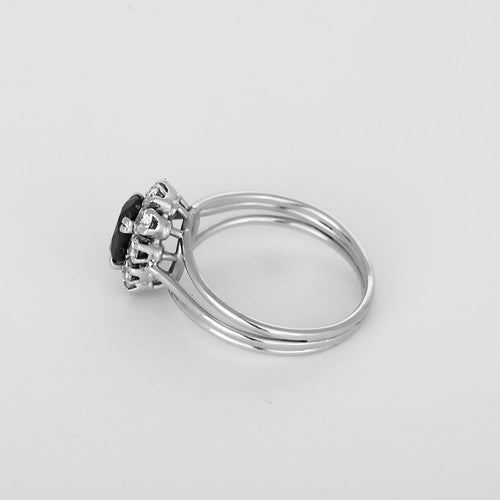 Bague 56 Bague marguerite en platine et or blanc, saphir et diamants 58 Facettes B260416