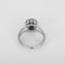 Bague 56 Bague marguerite en platine et or blanc, saphir et diamants 58 Facettes B260416