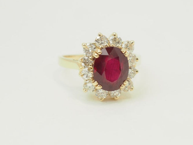 Bague 54 Bague entourage en or jaune 18 carats, rubis 4,03 ct et diamants 1,18 ct 58 Facettes F5046