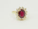 Bague 54 Bague entourage en or jaune 18 carats, rubis 4,03 ct et diamants 1,18 ct 58 Facettes F5046