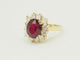 Bague 54 Bague entourage en or jaune 18 carats, rubis 4,03 ct et diamants 1,18 ct 58 Facettes F5046