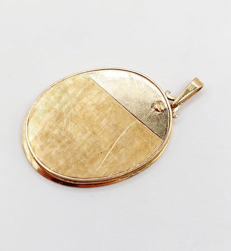 Pendentif Pendentif porte-photo reliquaire en or 18k, émail de Limoges, vers 1950 58 Facettes A07916