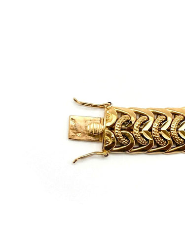 Bracelet Bracelet en or jaune 18 carats, maille américaine 58 Facettes M9579