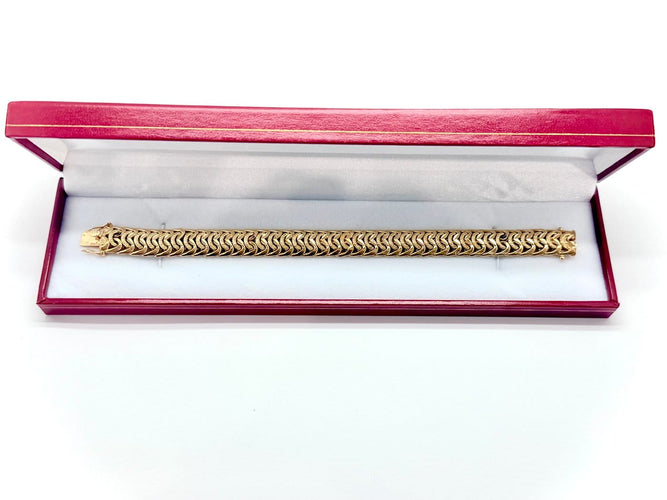 Bracelet Bracelet en or jaune 18 carats, maille américaine 58 Facettes M9579
