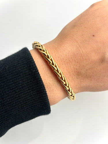 Bracelet Bracelet en or jaune 18 carats à maille palmier ronde 58 Facettes M9505