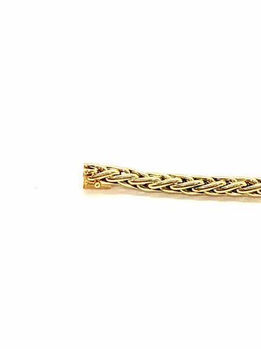 Bracelet Bracelet en or jaune 18 carats à maille palmier ronde 58 Facettes M9505