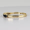 Bague 51 Bague demi-alliance en or jaune 14k avec sept saphirs 58 Facettes 2609003