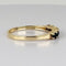 Bague 51 Bague demi-alliance en or jaune 14k avec sept saphirs 58 Facettes 2609003