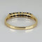 Bague 51 Bague demi-alliance en or jaune 14k avec sept saphirs 58 Facettes 2609003