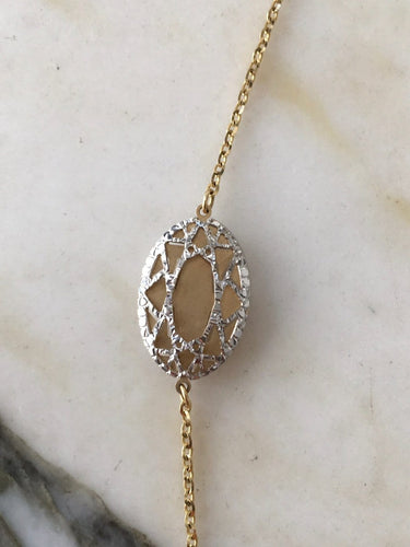 Collier Collier sautoir en or blanc et jaune 18k 58 Facettes 303