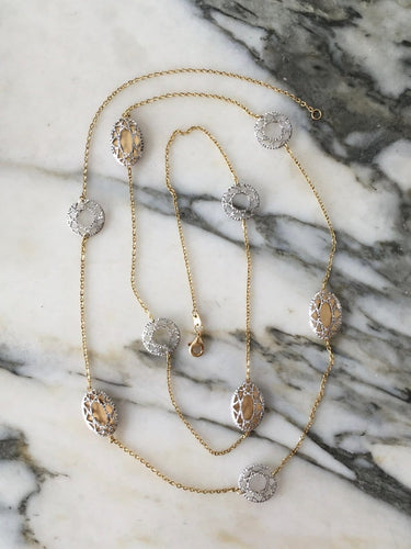Collier Collier sautoir en or blanc et jaune 18k 58 Facettes 303