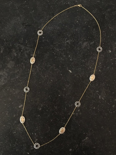 Collier Collier sautoir en or blanc et jaune 18k 58 Facettes 303