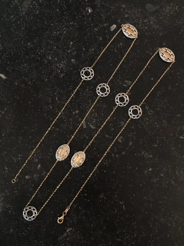 Collier Collier sautoir en or blanc et jaune 18k 58 Facettes 303