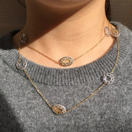 Collier Collier sautoir en or blanc et jaune 18k 58 Facettes 303