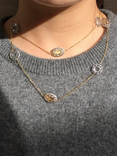 Collier Collier sautoir en or blanc et jaune 18k 58 Facettes 303