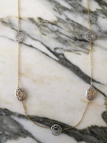 Collier Collier sautoir en or blanc et jaune 18k 58 Facettes 303