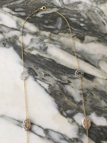 Collier Collier sautoir en or blanc et jaune 18k 58 Facettes 303