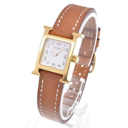 Montre Hermès Heure H - Montre à quartz en métal plaqué or et cuir 58 Facettes mew6pb8305