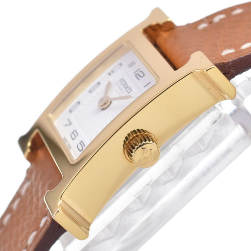 Montre Hermès Heure H - Montre à quartz en métal plaqué or et cuir 58 Facettes mew6pb8305
