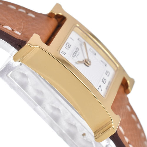 Montre Hermès Heure H - Montre à quartz en métal plaqué or et cuir 58 Facettes mew6pb8305