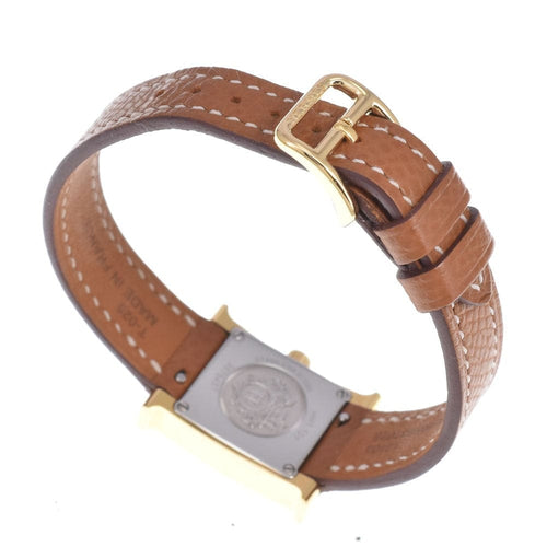 Montre Hermès Heure H - Montre à quartz en métal plaqué or et cuir 58 Facettes mew6pb8305