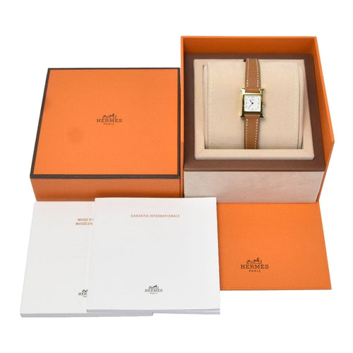 Montre Hermès Heure H - Montre à quartz en métal plaqué or et cuir 58 Facettes mew6pb8305