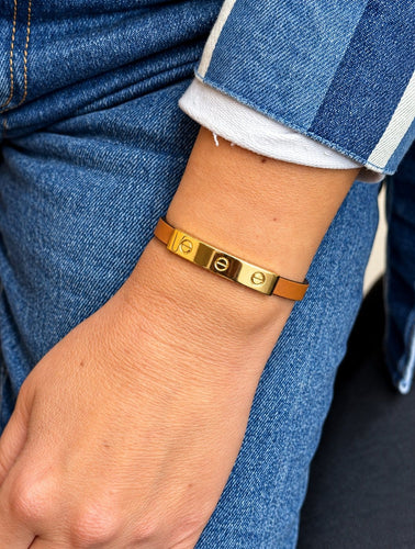 Bracelet Cartier - Bracelet Love trois vis en or jaune 18 carats et cuir marron 58 Facettes Cl