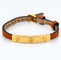 Bracelet Cartier - Bracelet Love trois vis en or jaune 18 carats et cuir marron 58 Facettes Cl