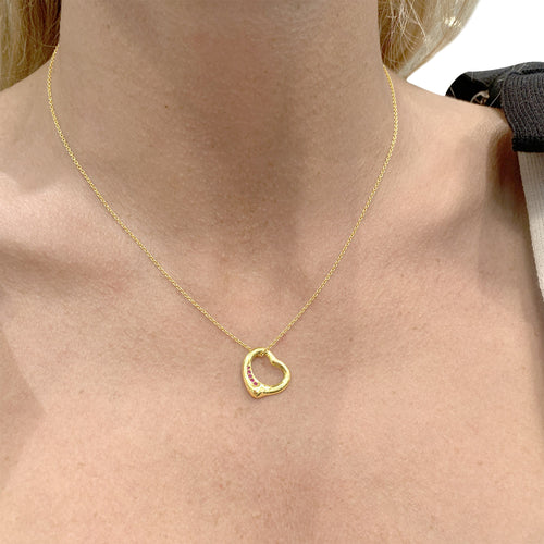 Collier Tiffany & Co. x Elsa Peretti - Collier Open Heart en or jaune et rubis 58 Facettes 36063