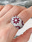 Bague 53 Bague dôme florale en or blanc 18k, rubis et diamants 58 Facettes 305