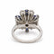 Bague 48 Carl Bucherer - Bague marguerite en or blanc 750‰, perle, diamants et saphirs 58 Facettes 260263R