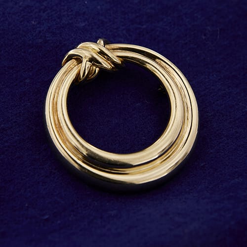 Broche Tiffany & Co. - Broche ronde nœud en or jaune 18 ct 58 Facettes 39787
