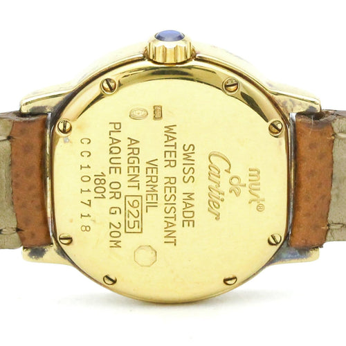 Montre Cartier - Montre Ronde Must de Cartier à quartz, acier inoxydable, boîtier plaqué or 58 Facettes d7p6m5wdwq