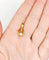 Pendentif Pendentif serre d’aigle en or 18k avec perle, vers 1900 58 Facettes A07802