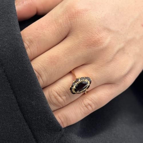 Bague Bague halo en or rose 18 ct avec grenats 58 Facettes 26868