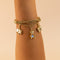 Bracelet Chopard - Bracelet Happy Diamonds en or jaune 18 carats, charms en diamants 58 Facettes