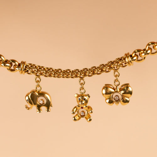 Bracelet Chopard - Bracelet Happy Diamonds en or jaune 18 carats, charms en diamants 58 Facettes