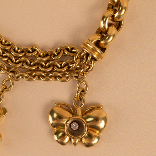 Bracelet Chopard - Bracelet Happy Diamonds en or jaune 18 carats, charms en diamants 58 Facettes