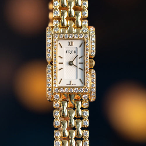 Montre Fred - Montre vintage des années 1980 en or jaune 750 et diamants 58 Facettes