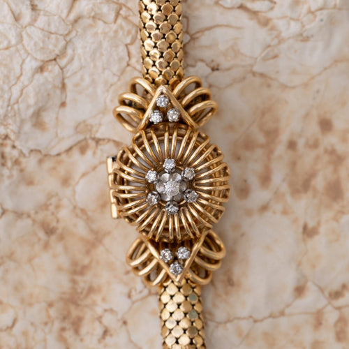 Montre Barichella - Montre secrète des années 1950 en or jaune 18 carats avec diamants 58 Facettes
