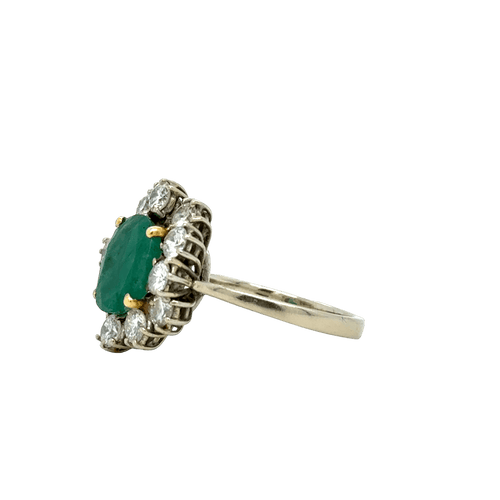 Bague 50 Bague marguerite en or blanc, émeraude et diamants 58 Facettes