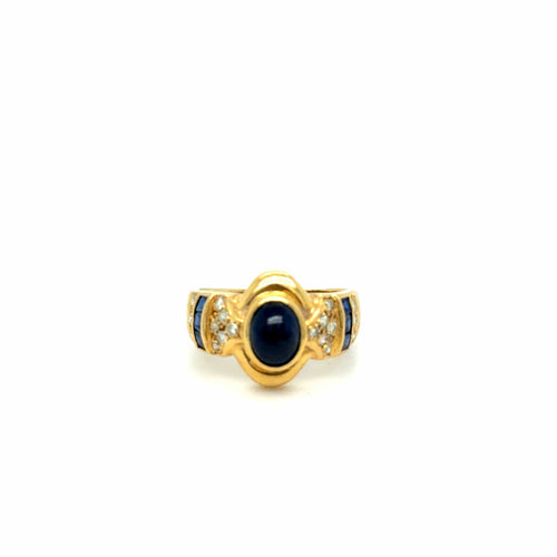 Bague 52 Bague en or jaune 18k, saphir cabochon et diamants, époque 1980 58 Facettes