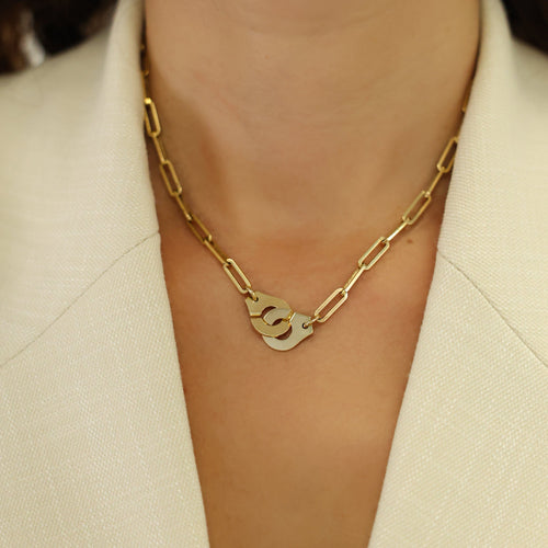 Collier Dinh Van - Collier Menottes R12 en or jaune 18 carats 58 Facettes