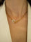 Collier Dinh Van - Collier Menottes R12 en or jaune 18 carats 58 Facettes